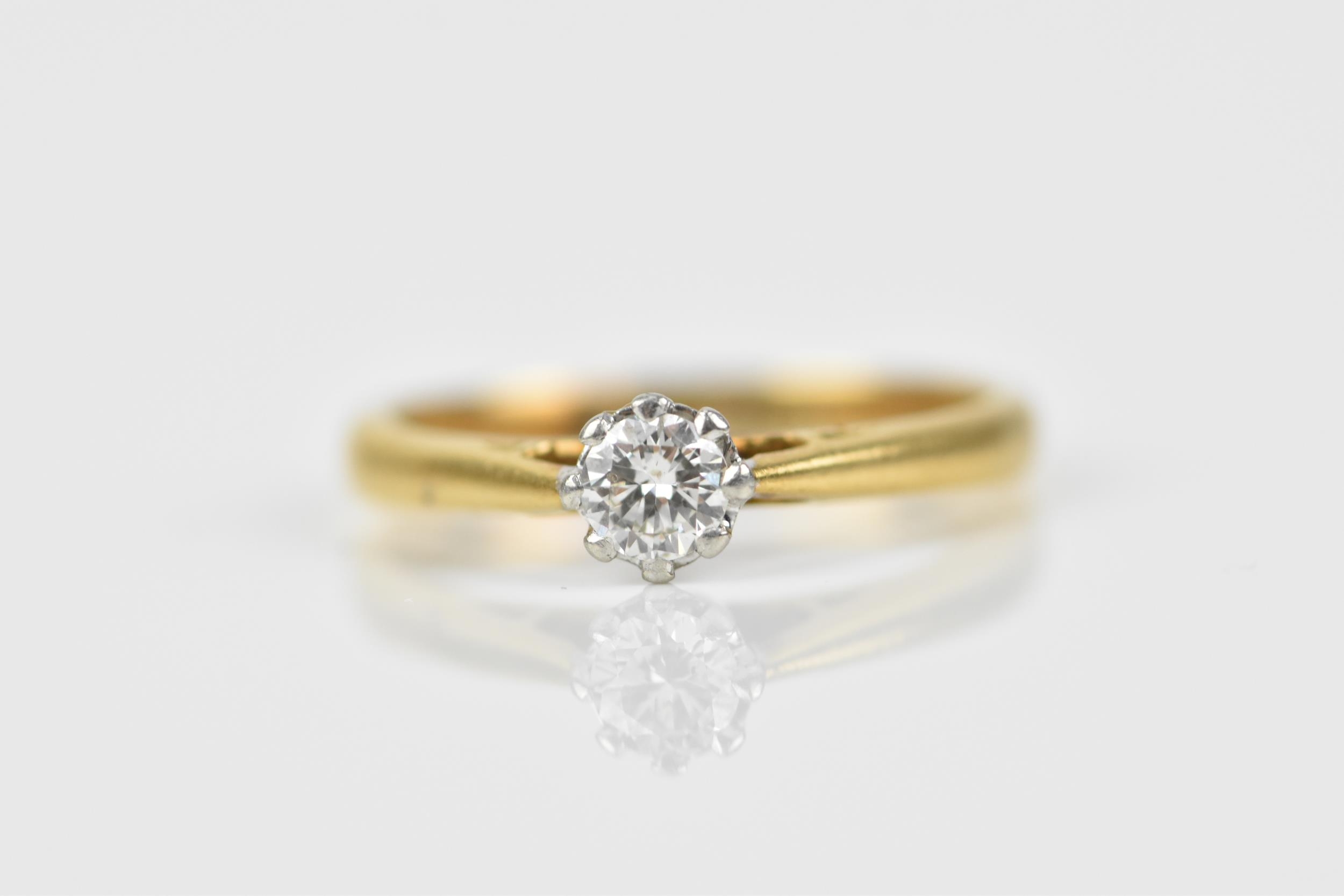 An 18ct yellow gold, platinum and diamond solitaire ring, the brilliant cut stone set in an eight - Image 6 of 6