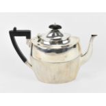 A Victorian silver teapot by James Dixon & Sons Ltd, Sheffield 1889, with part fluted oval body, the