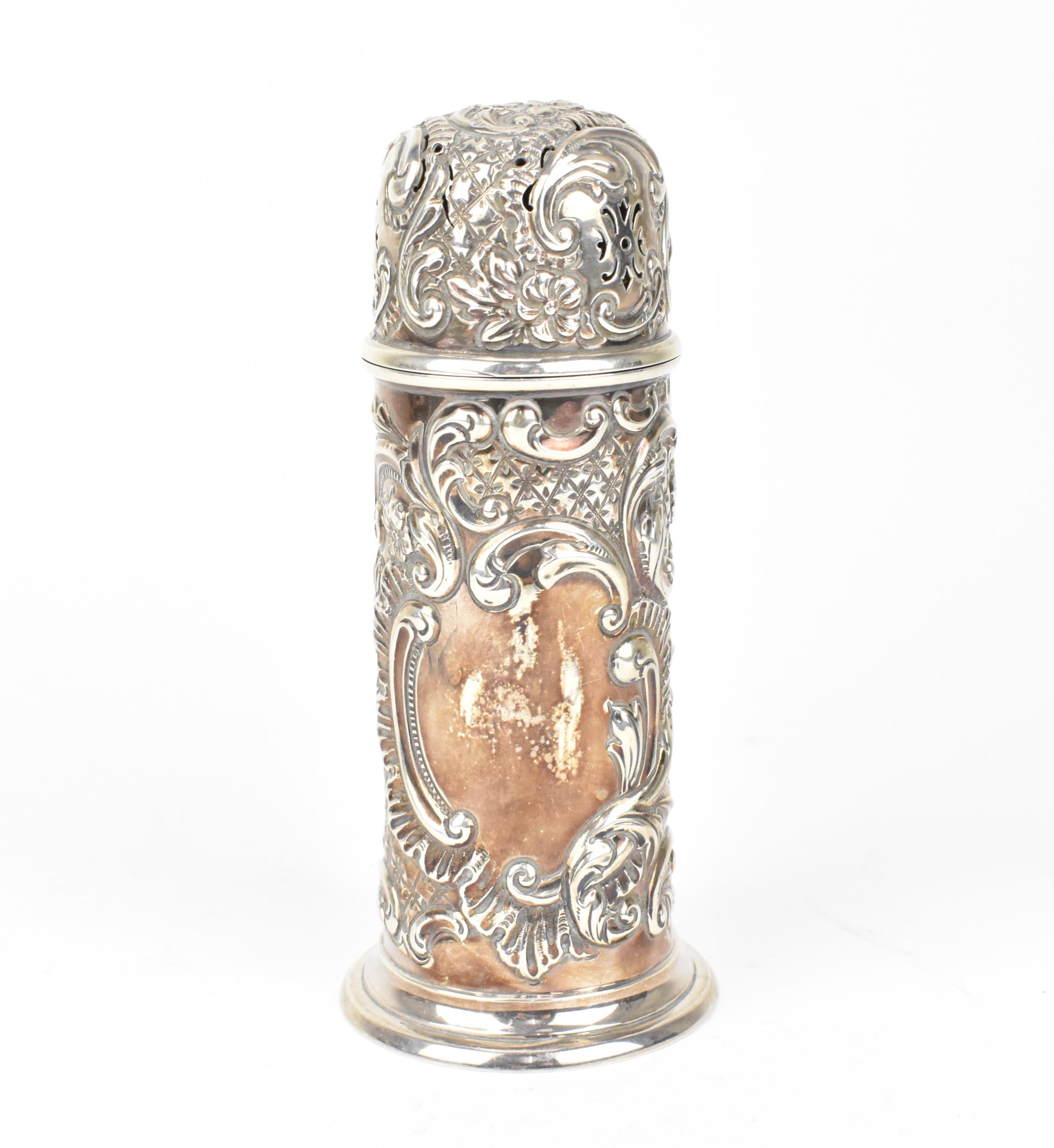 An Edwardian silver sugar sifter by Thomas Hayes, Birmingham 1901, in the lighthouse form with