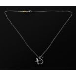 An 18ct white gold and diamond Boodles necklace, the thin cable chain with S letter pendant inset