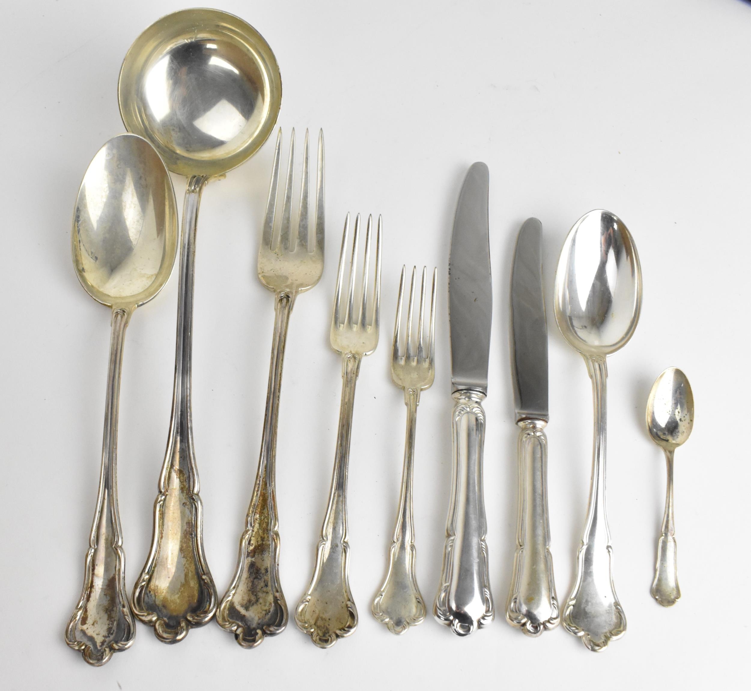 A Continental silver canteen of cutlery for eleven setting, consisting of two drawers comprising: - Image 4 of 10