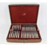 A cased set of French silver and steel bladed knives by Maison Cardeilhac, Paris, Circa 1900,