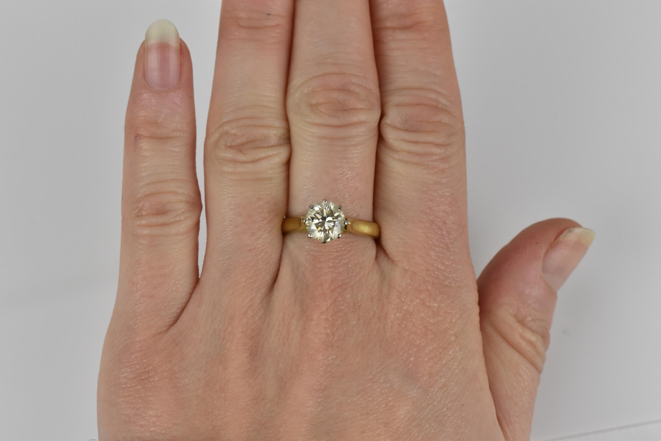 An 18ct yellow gold, white metal and solitaire diamond ring, the brilliant cut stone in an eight - Image 7 of 8