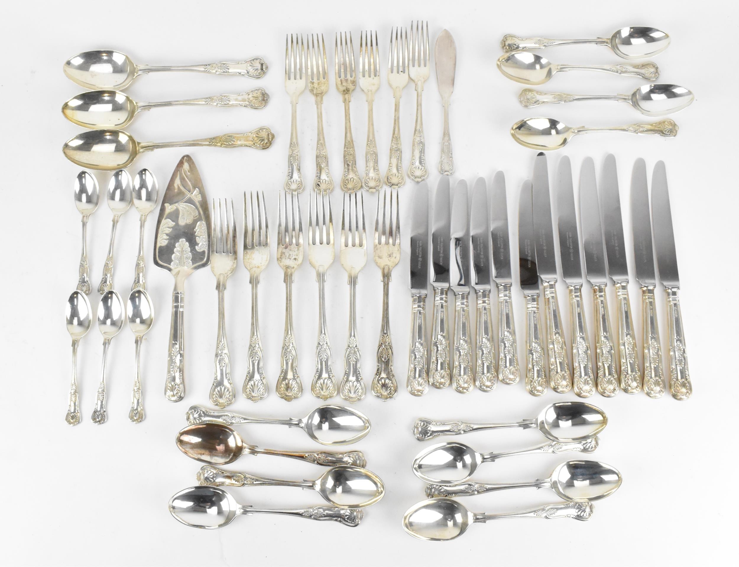 A set of Elizabeth II silver flatware for six setting by Hugh Foulerton, Sheffield 1982, in the