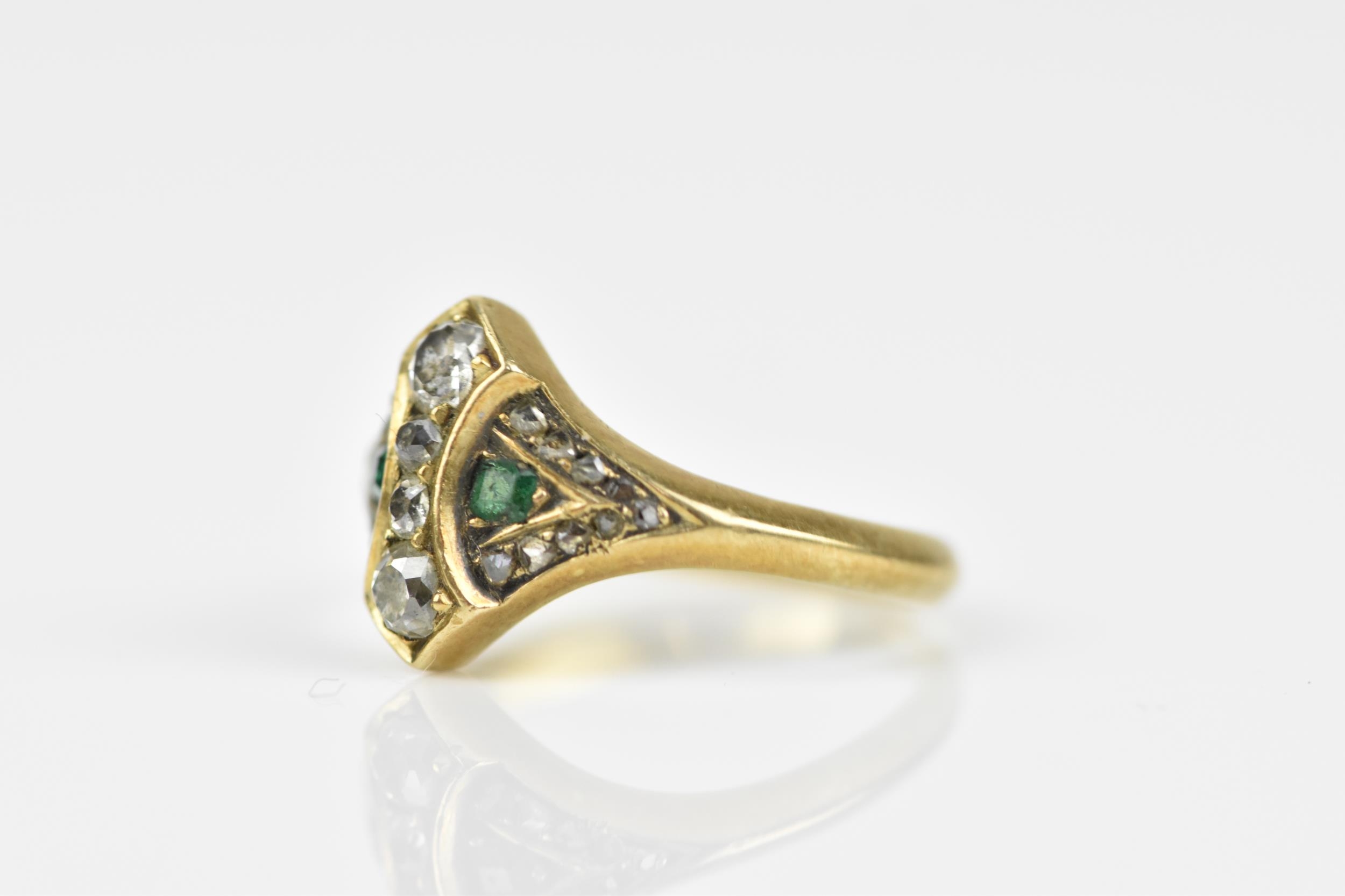 An early 20th century diamond and emerald dress ring, set with four graduated old mine cut - Image 2 of 5