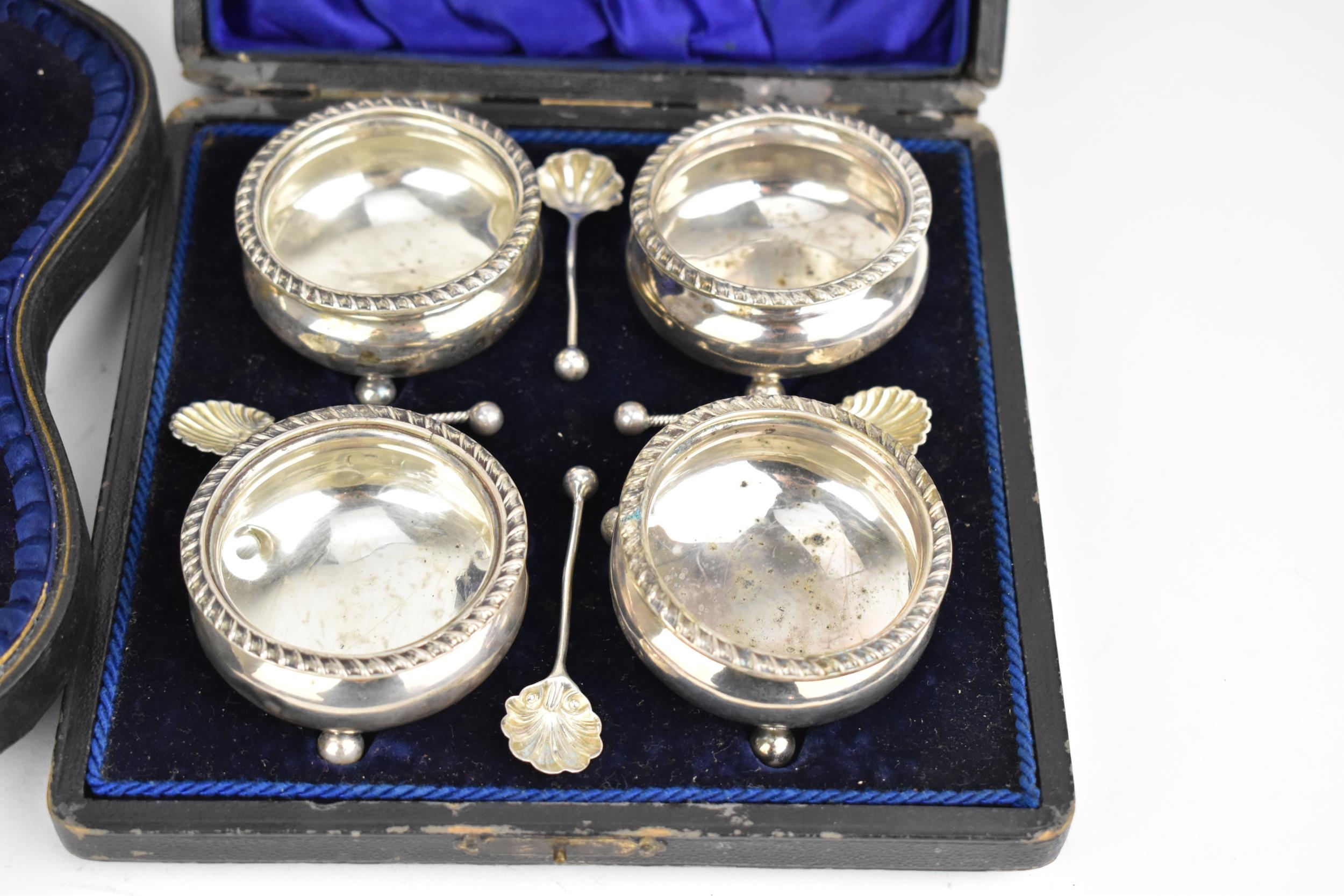 A cased set of Victorian silver salts, Sheffield 1896, with gadrooned rim, on ball feet, with four - Image 2 of 8