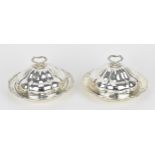 A pair of George V silver entree dishes by Atkin Brothers, Sheffield 1927, each with lids surmounted