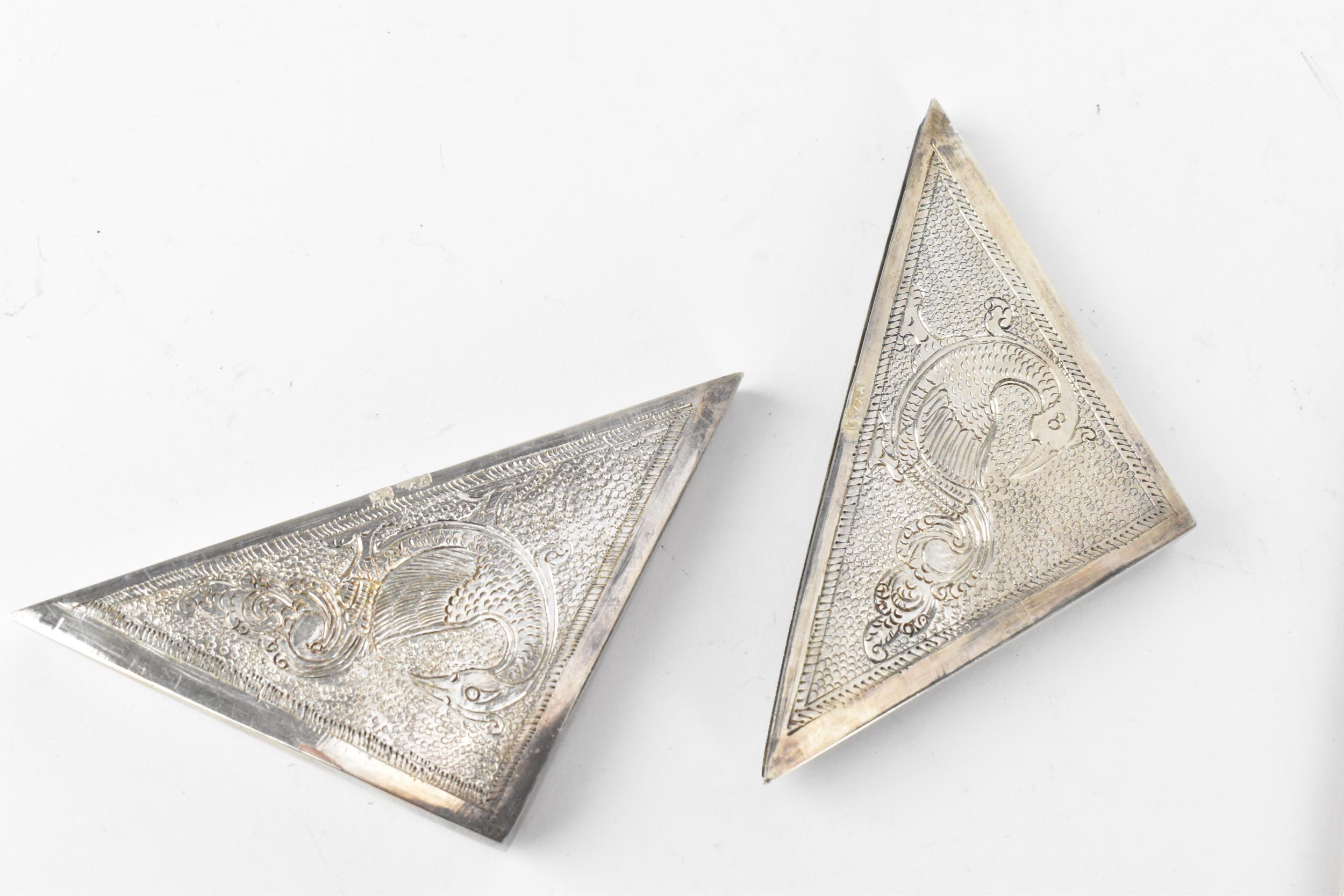 A set of four Sri Lankan (Ceylon) silver corner protectors, probably for important documents or - Image 3 of 5