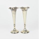 A pair of late 19th century Chinese export silver trumpet vases by Cunwo, Hong Kong, with hammered