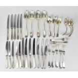 A mixed collection of English silver flatware, to include a set of six round handled dinner