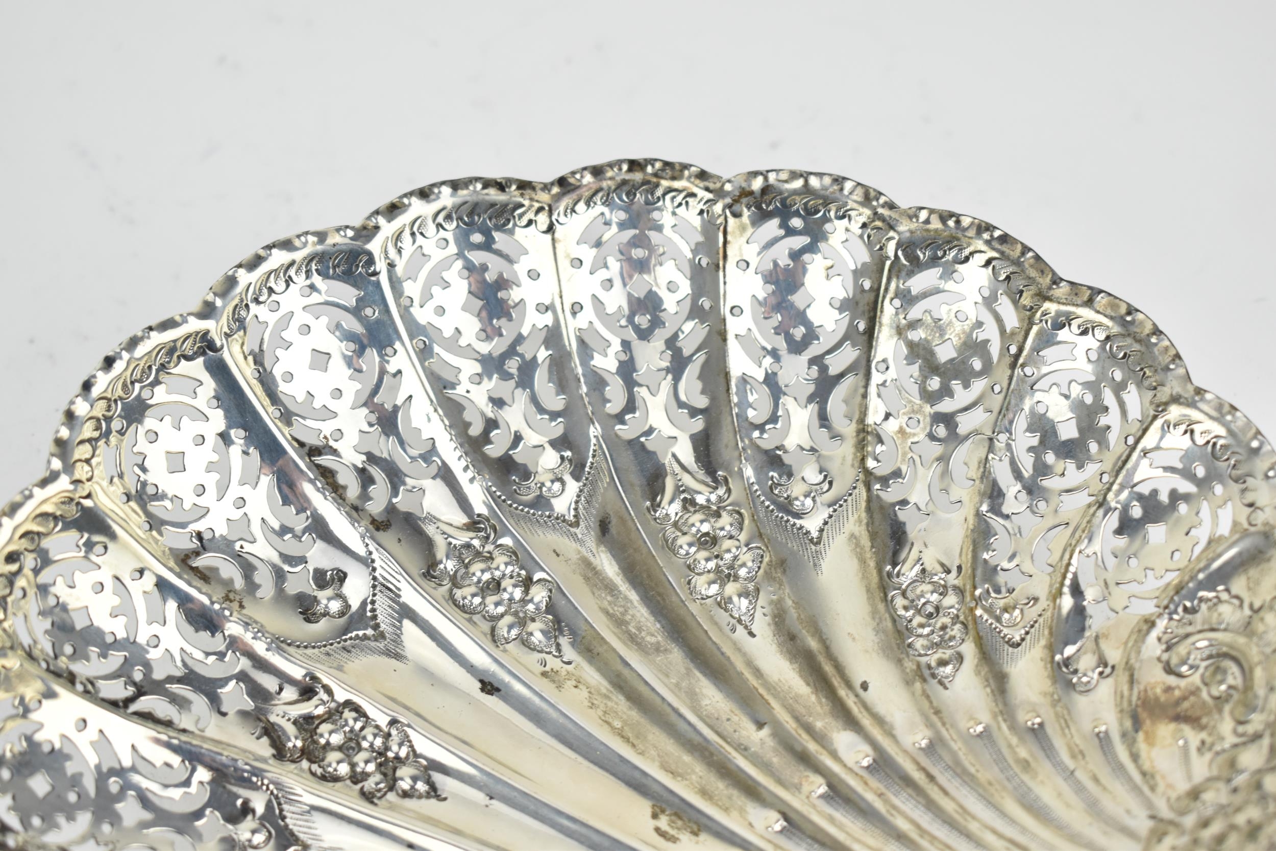 A late Victorian silver pierced bonbon dish by Atkin Brothers, Sheffield 1896, of shell form with - Image 3 of 5