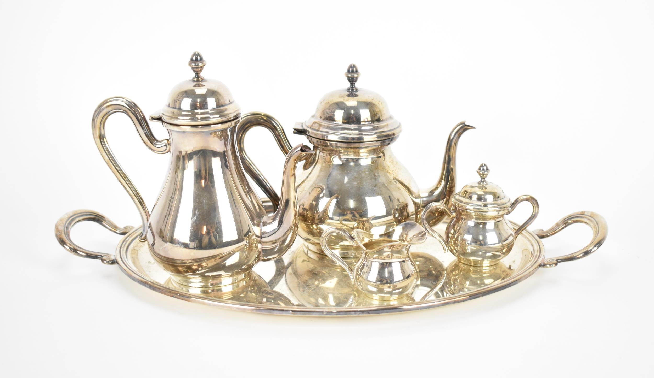 A 20th century Italian silver teaset by Greggio, comprising a teapot, hot water pot, lidded sugar