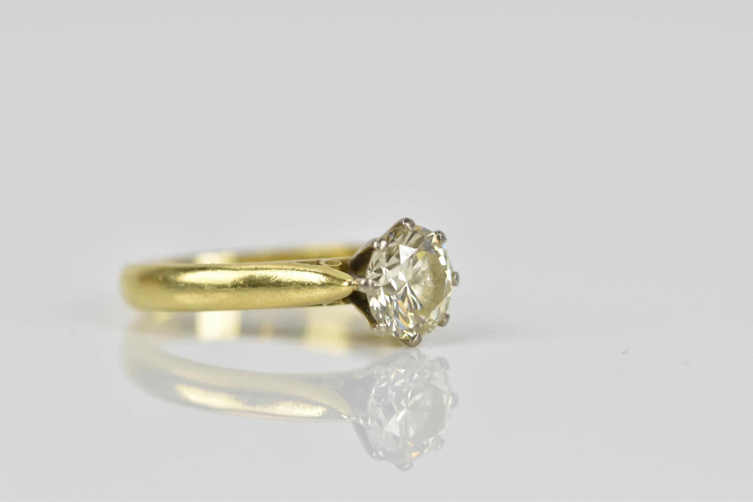 An 18ct yellow gold, white metal and solitaire diamond ring, the brilliant cut stone in an eight - Image 3 of 8