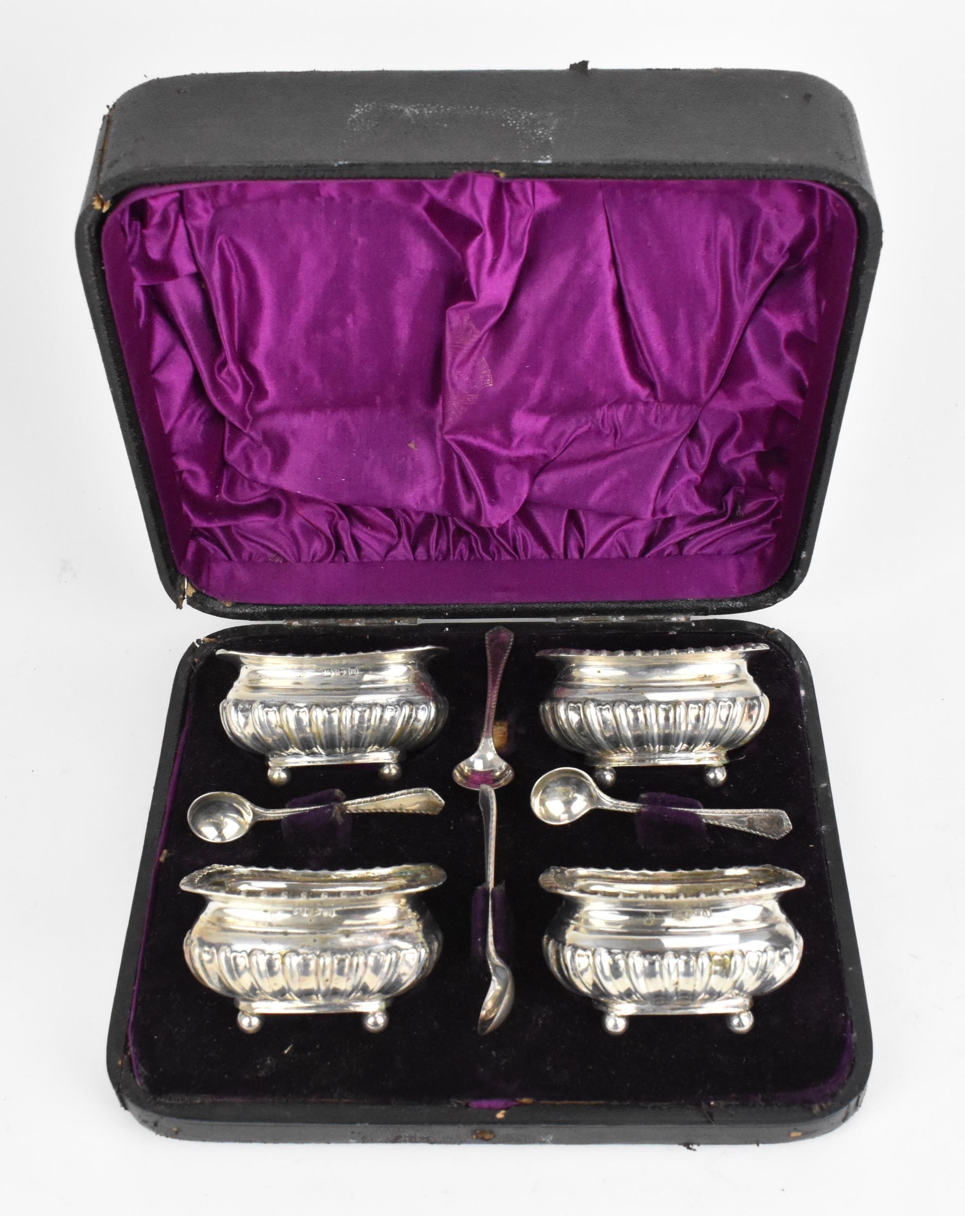 A cased set of Victorian silver salts by James Deakin & Sons, Chester 1896, of rectangular form with