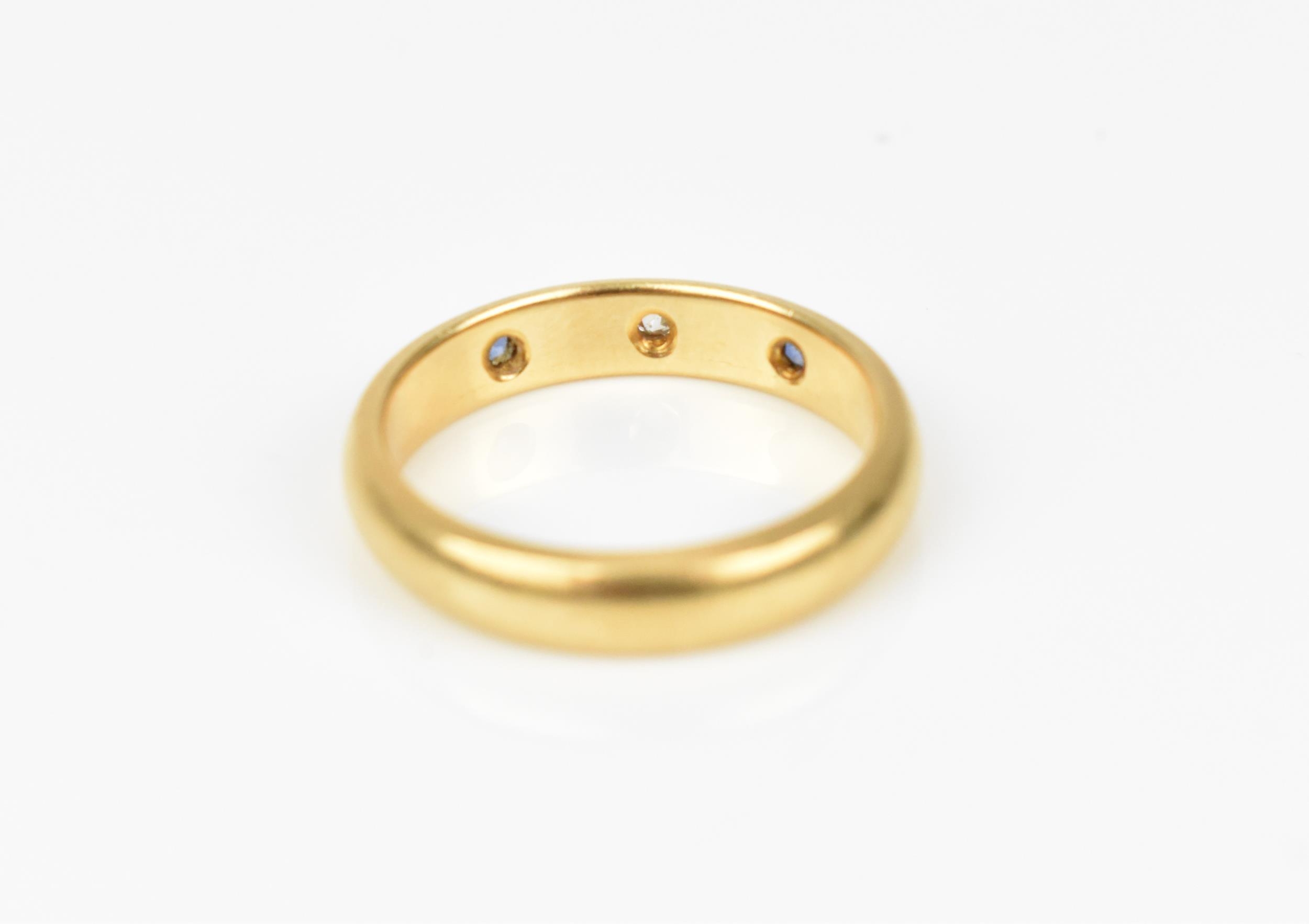 An 18ct yellow gold, diamond and sapphire gypsy ring, set with a central old cut diamond flanked - Image 2 of 4