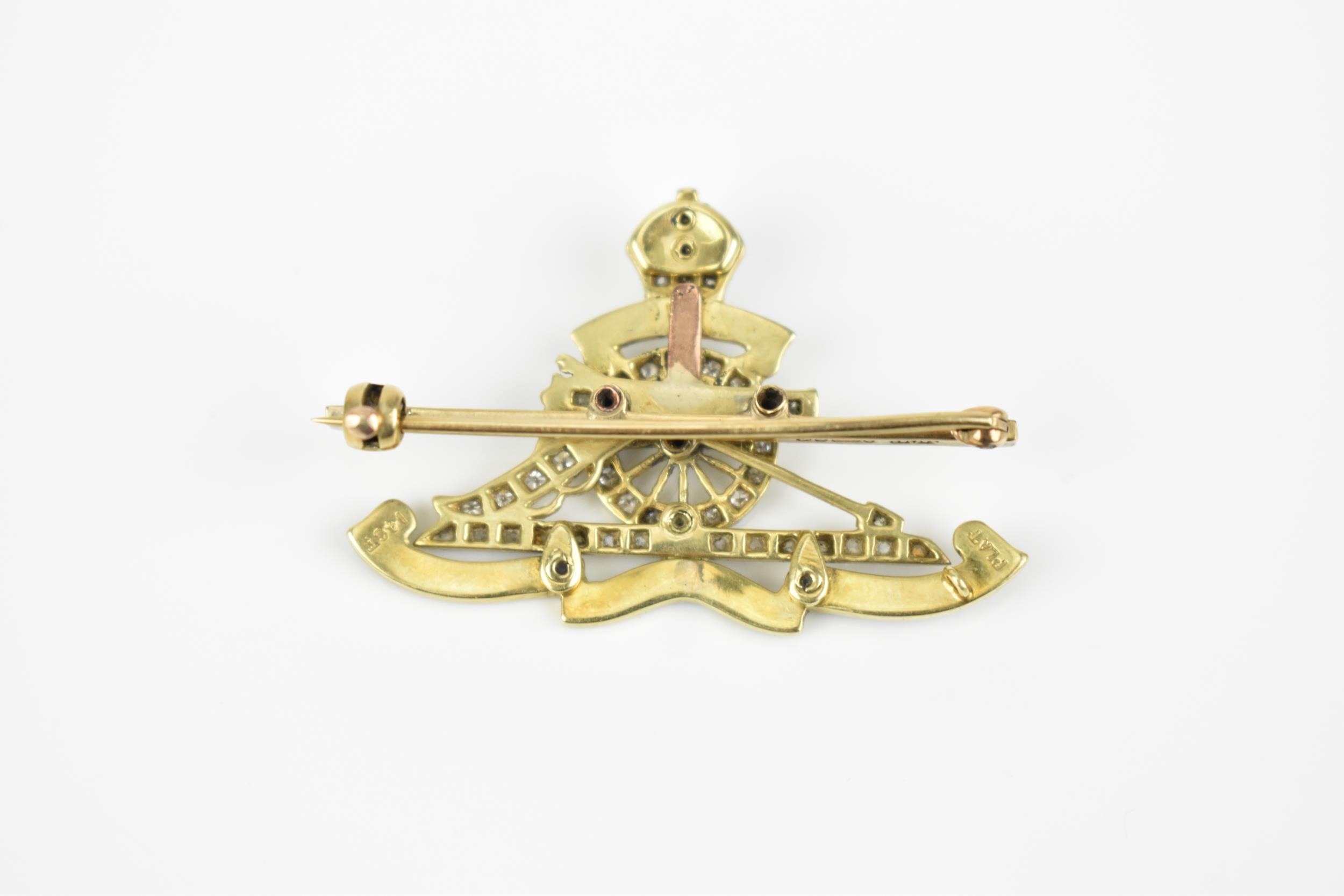 A 14ct yellow gold, platinum and diamond Royal Regiment of Artillery sweetheart cap badge, with - Image 3 of 4