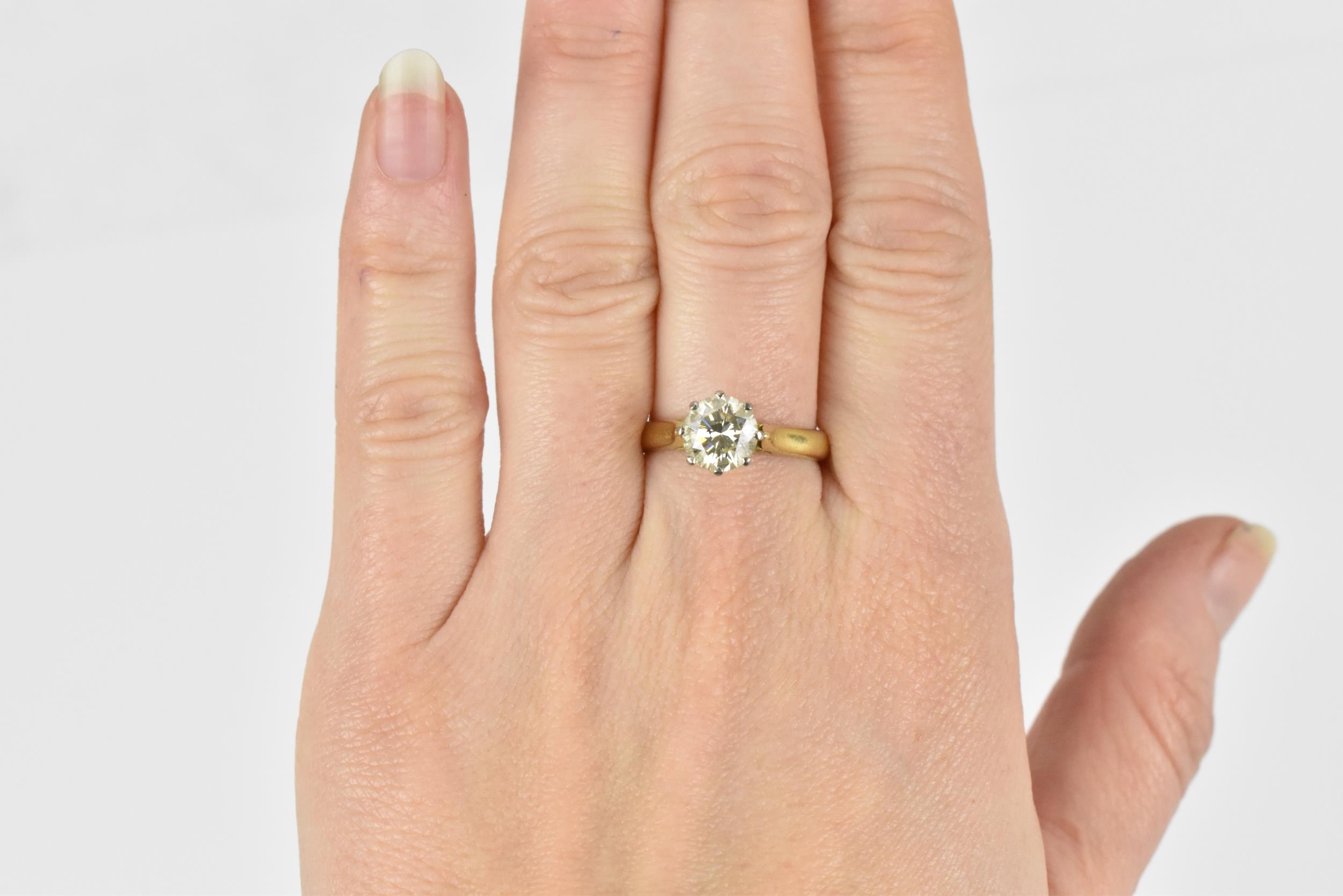 An 18ct yellow gold, white metal and solitaire diamond ring, the brilliant cut stone in an eight - Image 8 of 8