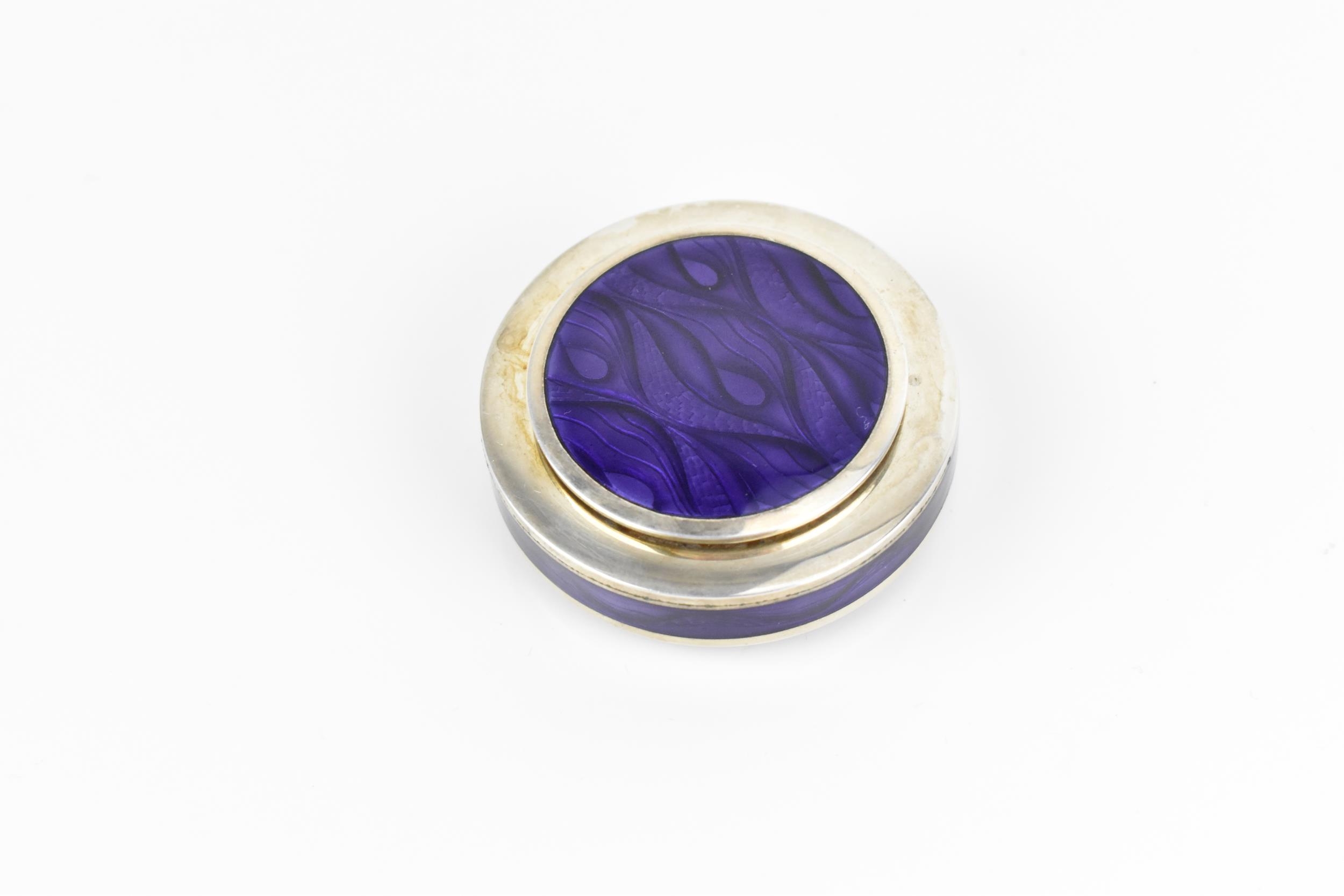 A modern British silver and enamel pill box, of circular form with purple wave pattern to the - Image 3 of 8