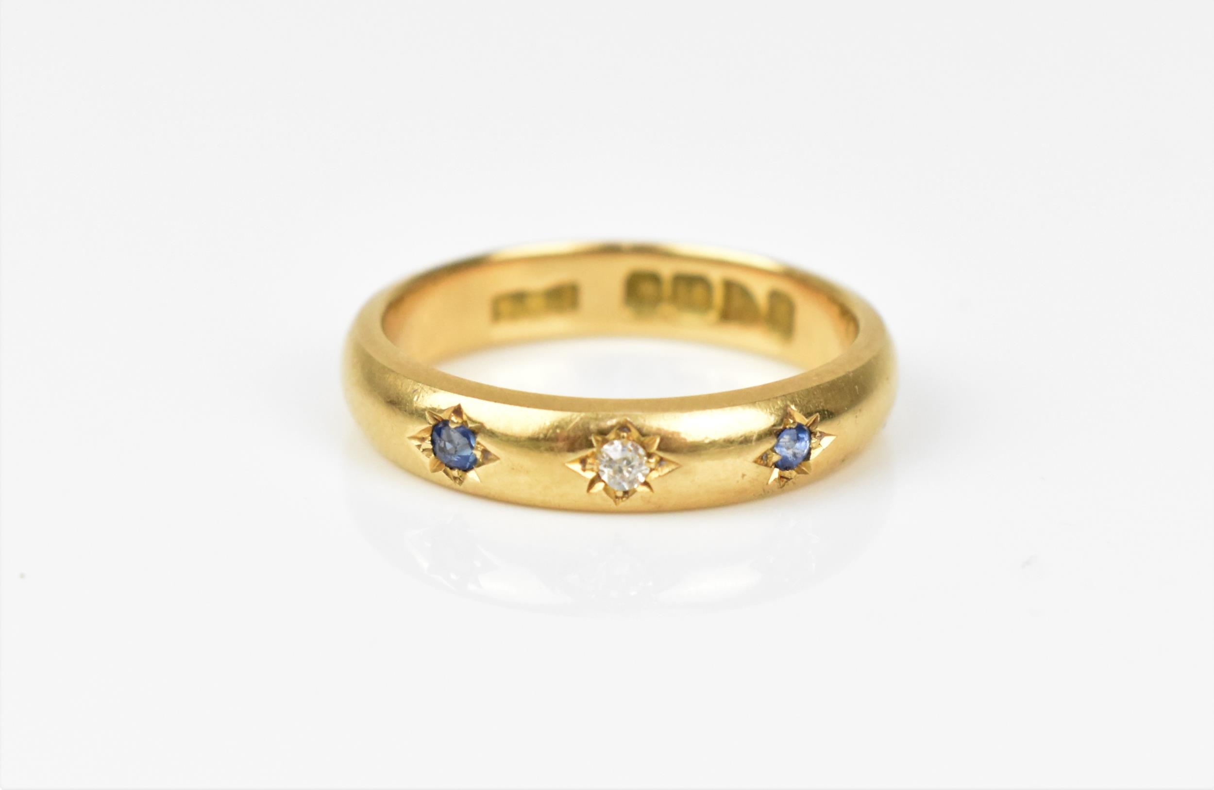 An 18ct yellow gold, diamond and sapphire gypsy ring, set with a central old cut diamond flanked - Image 4 of 4