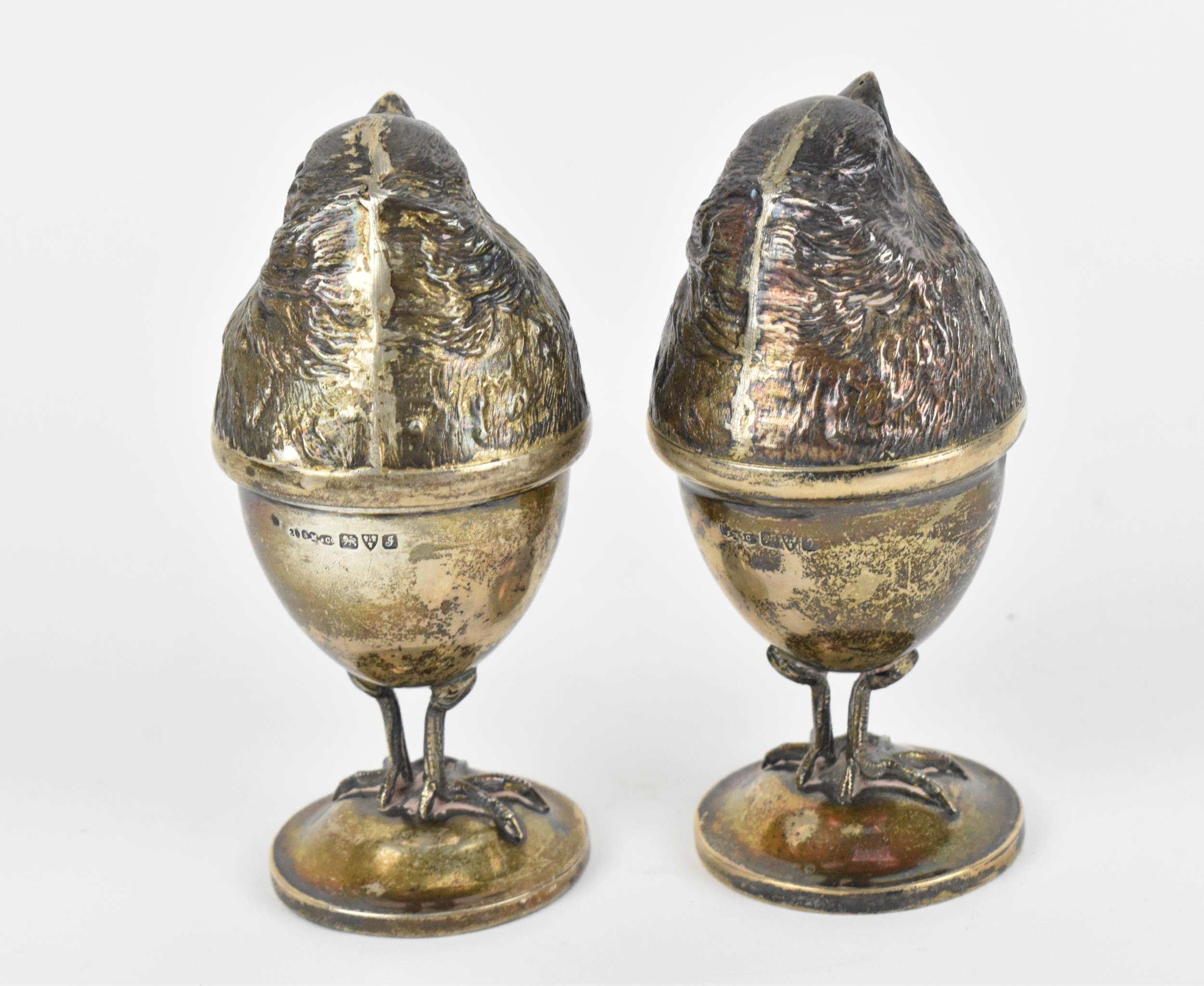 Two Edwardian silver novelty egg cups by Sampson Mordan & Co Ltd, Chester 1909, modelled as - Image 4 of 8