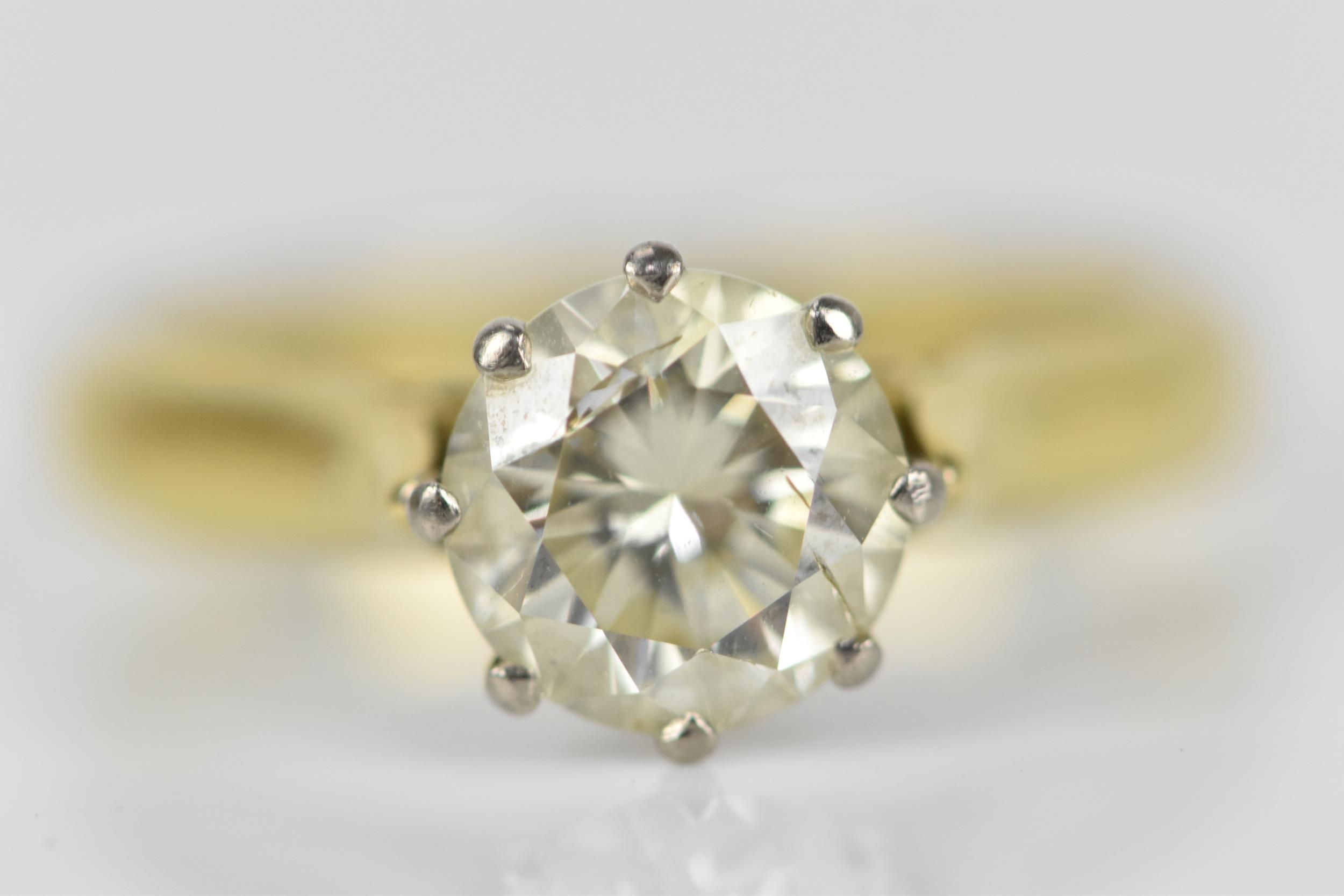 An 18ct yellow gold, white metal and solitaire diamond ring, the brilliant cut stone in an eight - Image 4 of 8