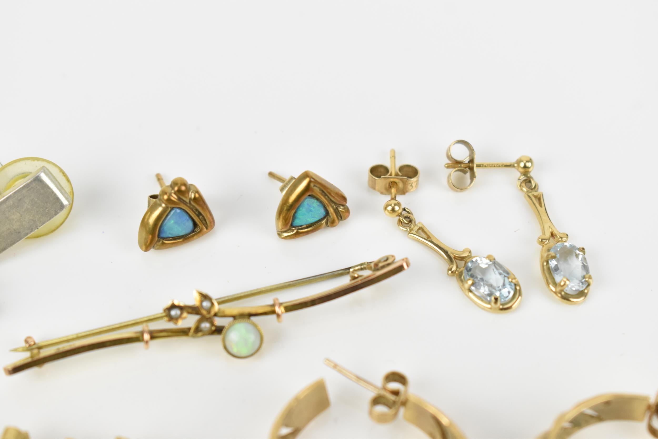 A small collection of jewellery to include a pair of 9ct gold hoop earrings, a 9ct gold, opal and - Image 2 of 9