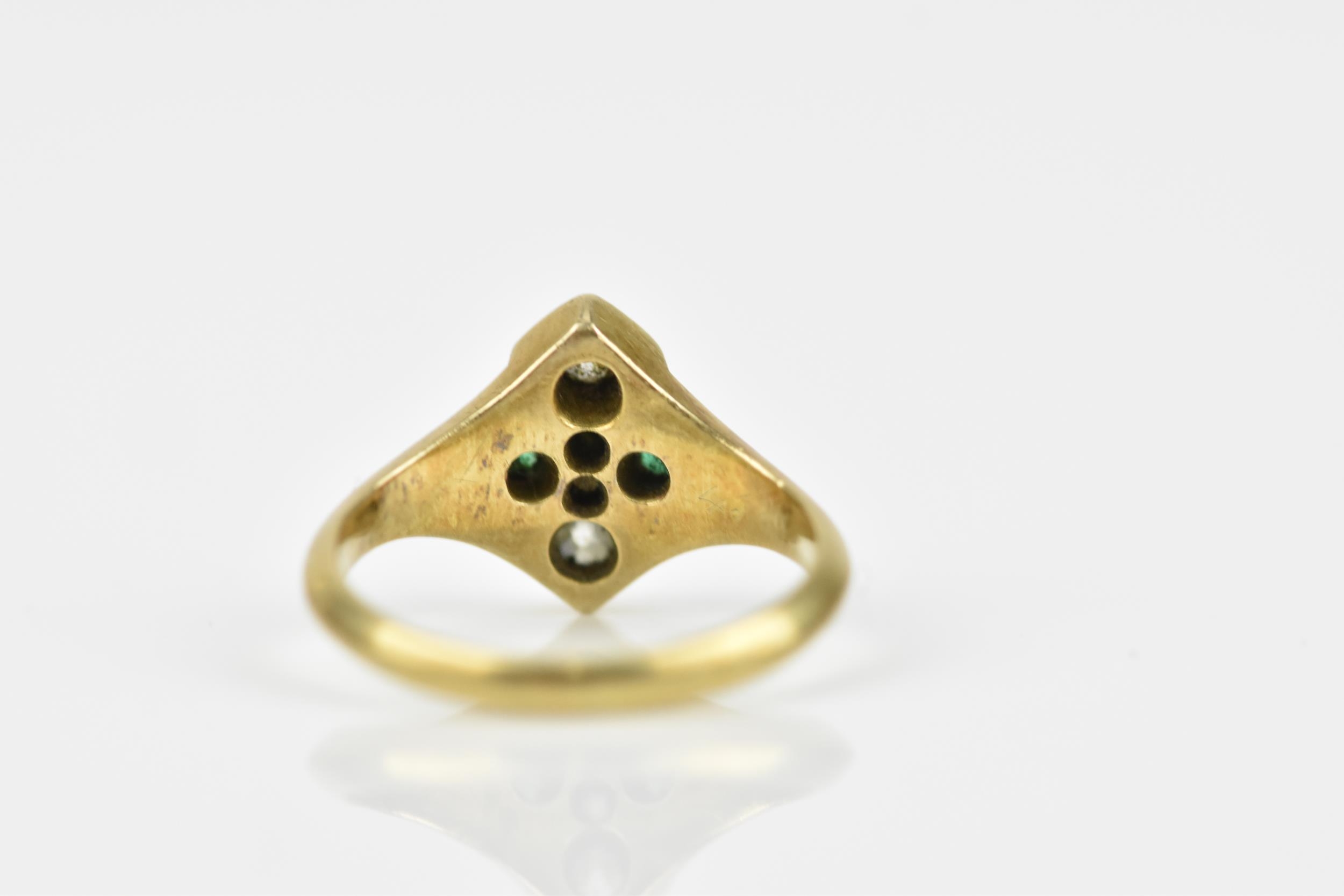 An early 20th century diamond and emerald dress ring, set with four graduated old mine cut - Image 4 of 5