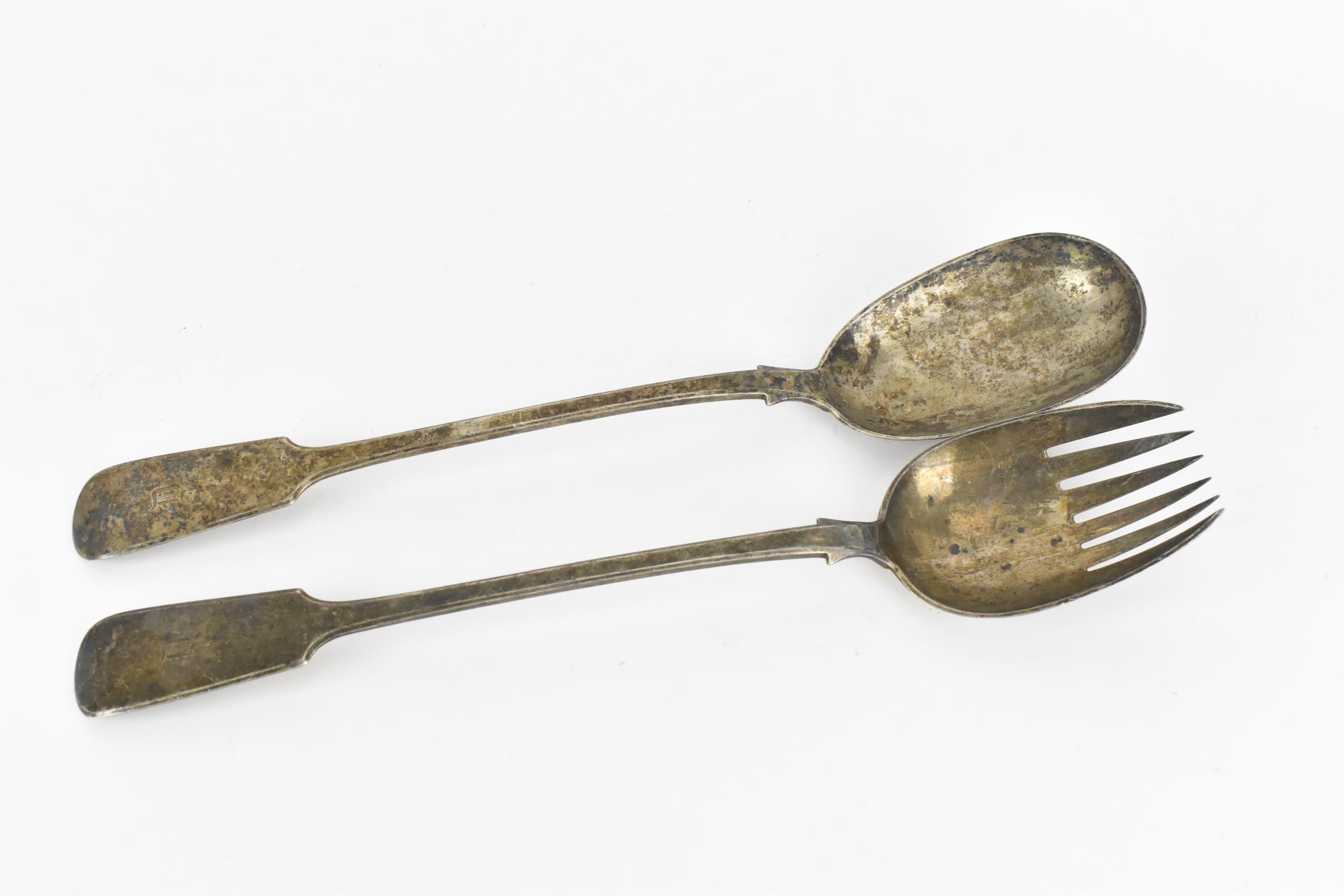 A pair of Victorian silver servers by Elizabeth & John Eaton, London 1860, in the fiddle pattern,