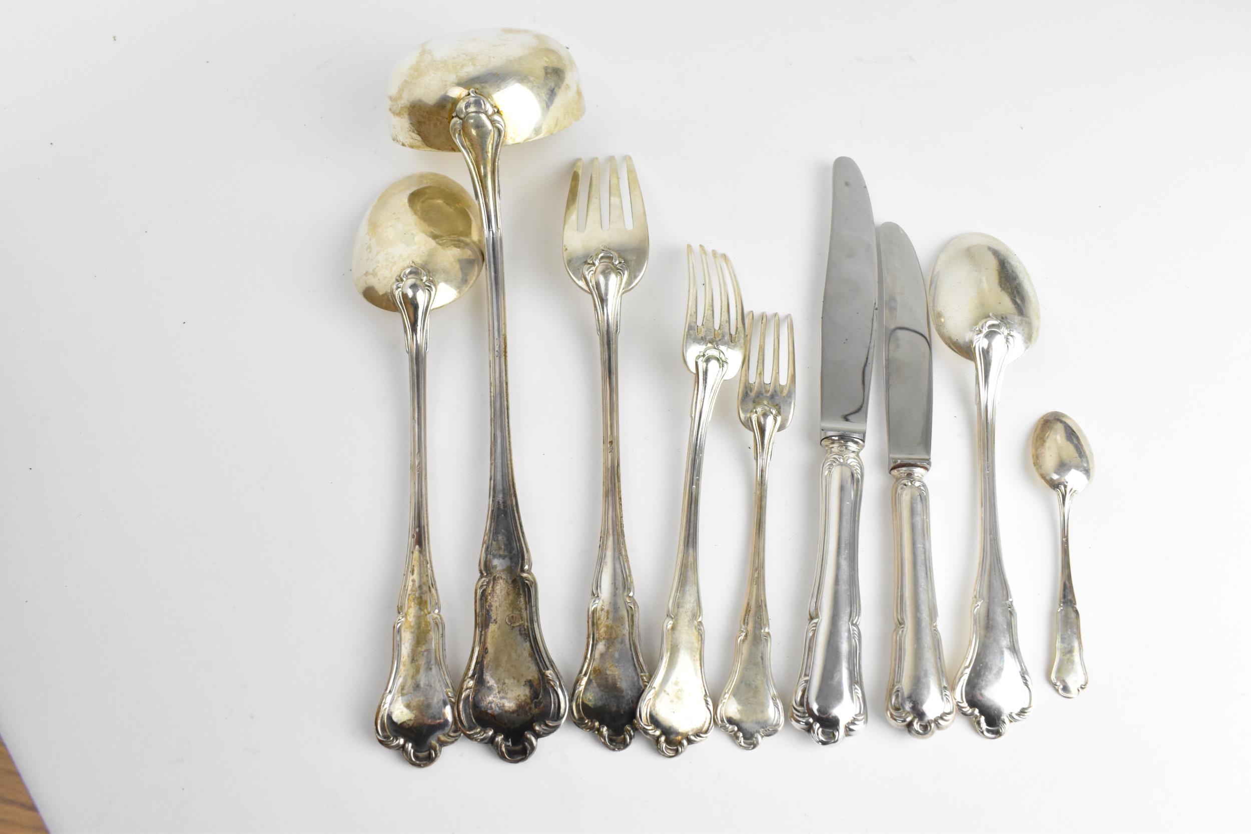 A Continental silver canteen of cutlery for eleven setting, consisting of two drawers comprising: - Image 6 of 10