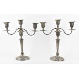 A pair of late Victorian silver convertible candelabra by Fordham & Faulkner, Sheffield 1898, in the