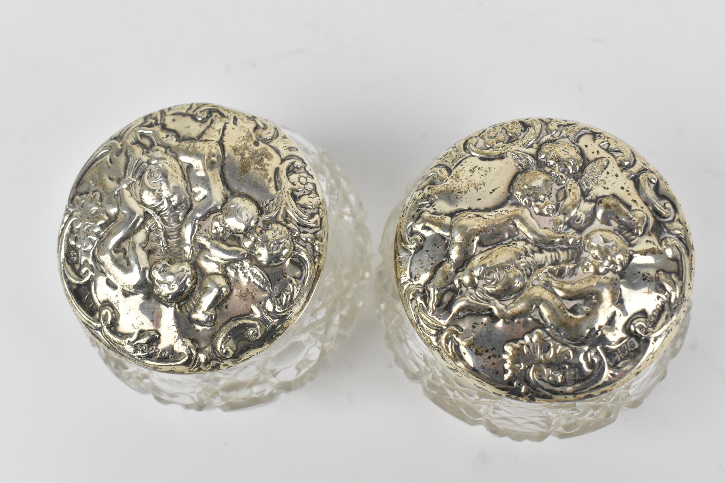 A small four piece Edwardian cut glass and silver dressing table set, comprising a pair of scent - Image 3 of 5