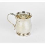 A George V silver tankard by Atkin Brothers, Sheffield 1918, of typical bulbous form with loop