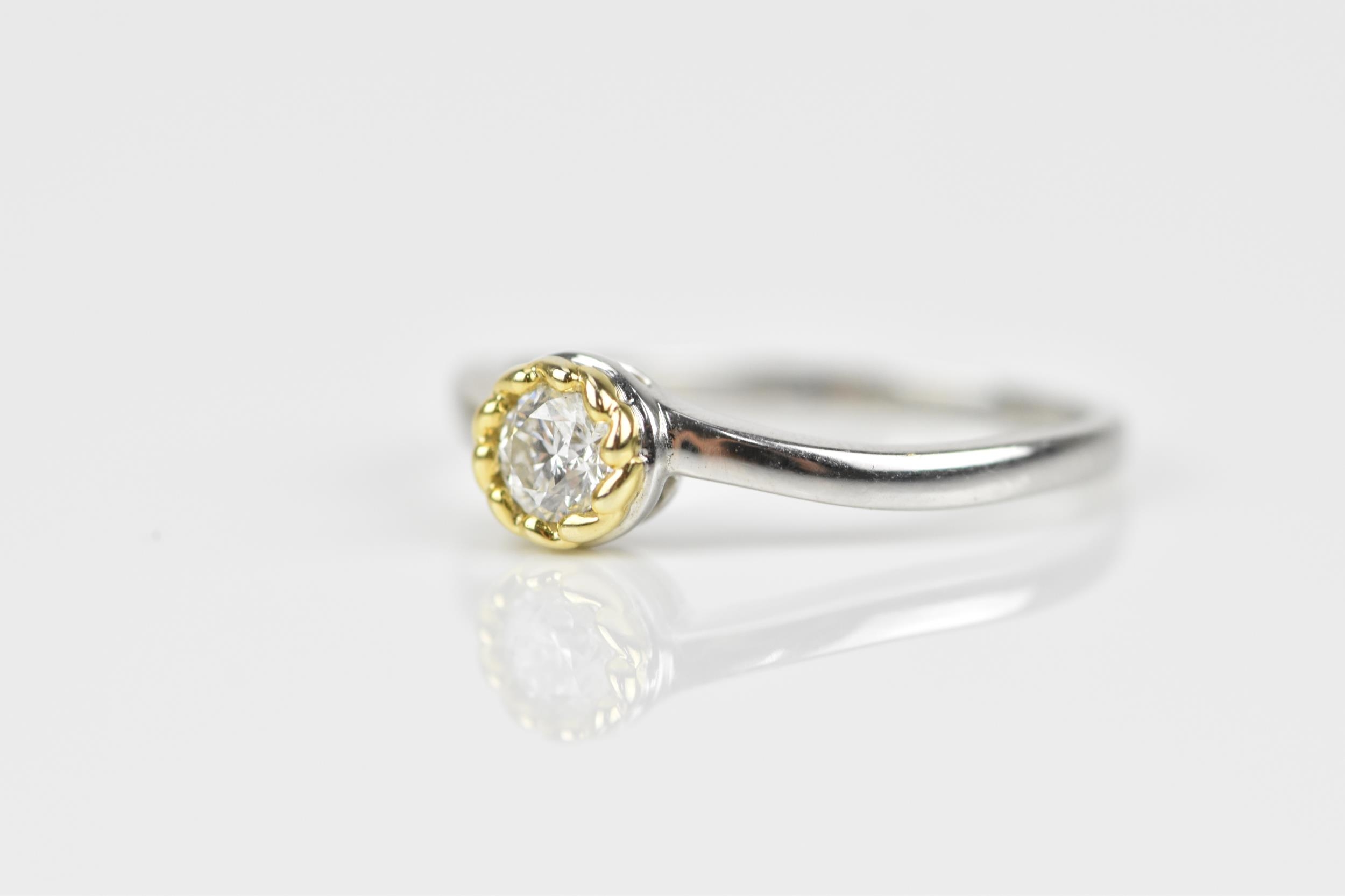 An 18ct white gold and diamond solitaire ring, the round brilliant cut stone approx 0.25 ct, size M - Image 2 of 4