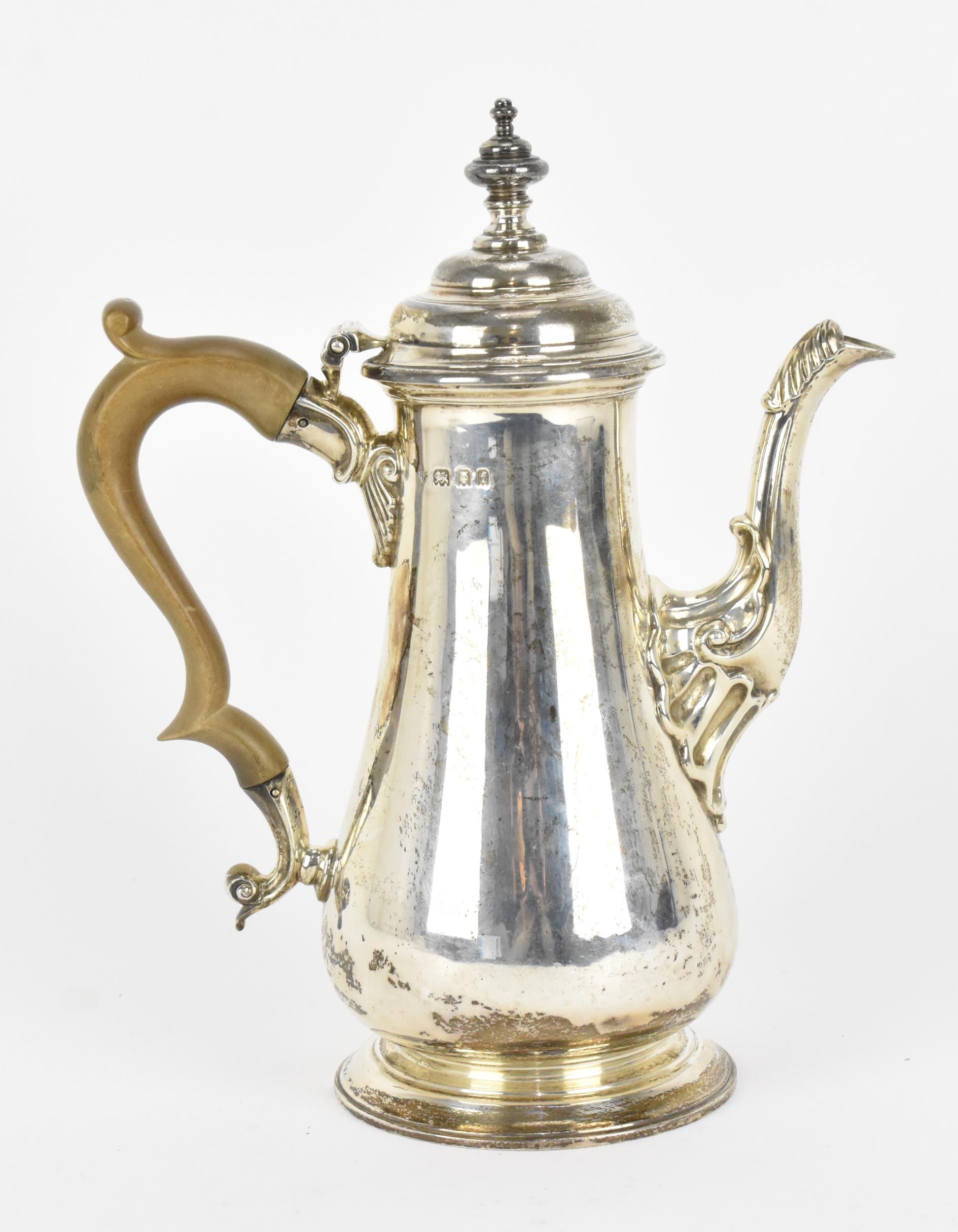 A George V silver coffee pot by Charles & Richard Comyns, London 1921, of tapered form with