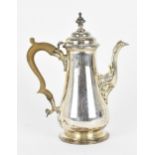 A George V silver coffee pot by Charles & Richard Comyns, London 1921, of tapered form with
