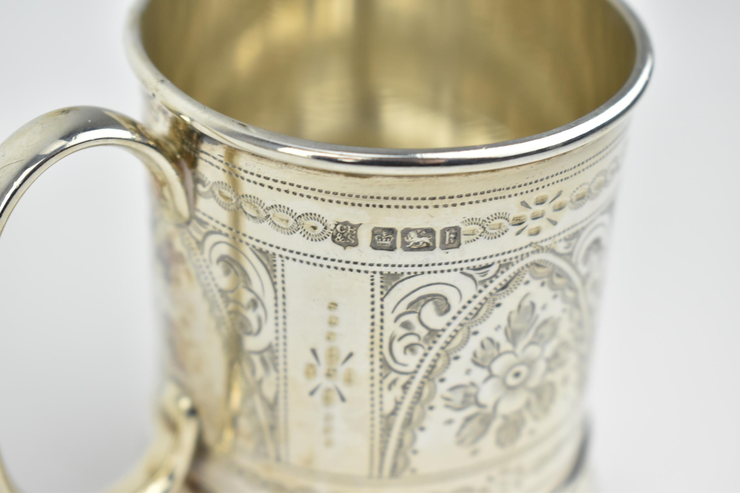 An Edwardian silver christening mug by Cooper Brothers & Sons Ltd, Sheffield 1902, of cylindrical - Image 3 of 5