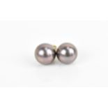 A pair of 18ct yellow gold and Tahitian pearl earrings, the pearls approx. 1cm diameter, combined