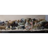 A large lot of wooden, ceramic, bronzed composition and resin model animals to include Beswick and