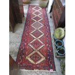 An Iranian Hamadon style runner, hand woven with diamond motif, 287cm x 80cm Location: