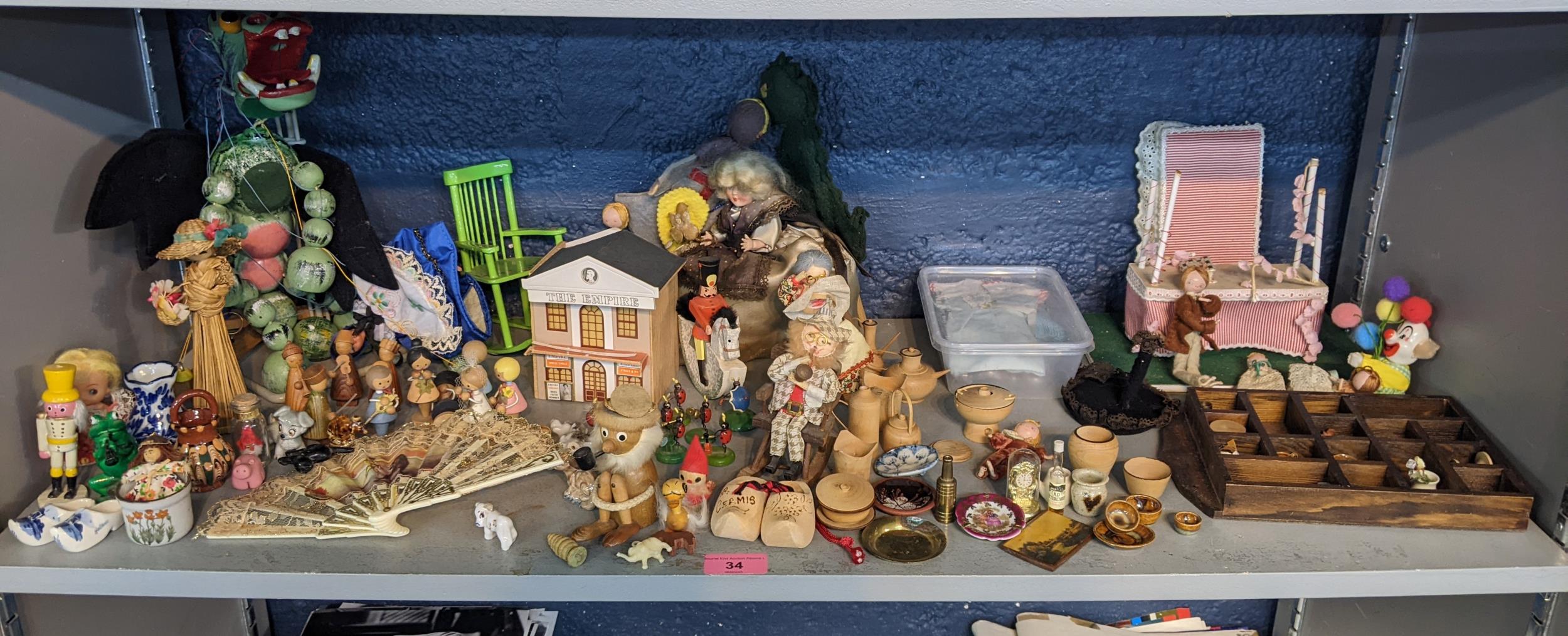 A mixed lot of vintage ornaments and toys to include a Pelham puppet dragon, puppets of St George