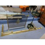 A brass extending fire fender together with a fire guard and a stick stand Location: