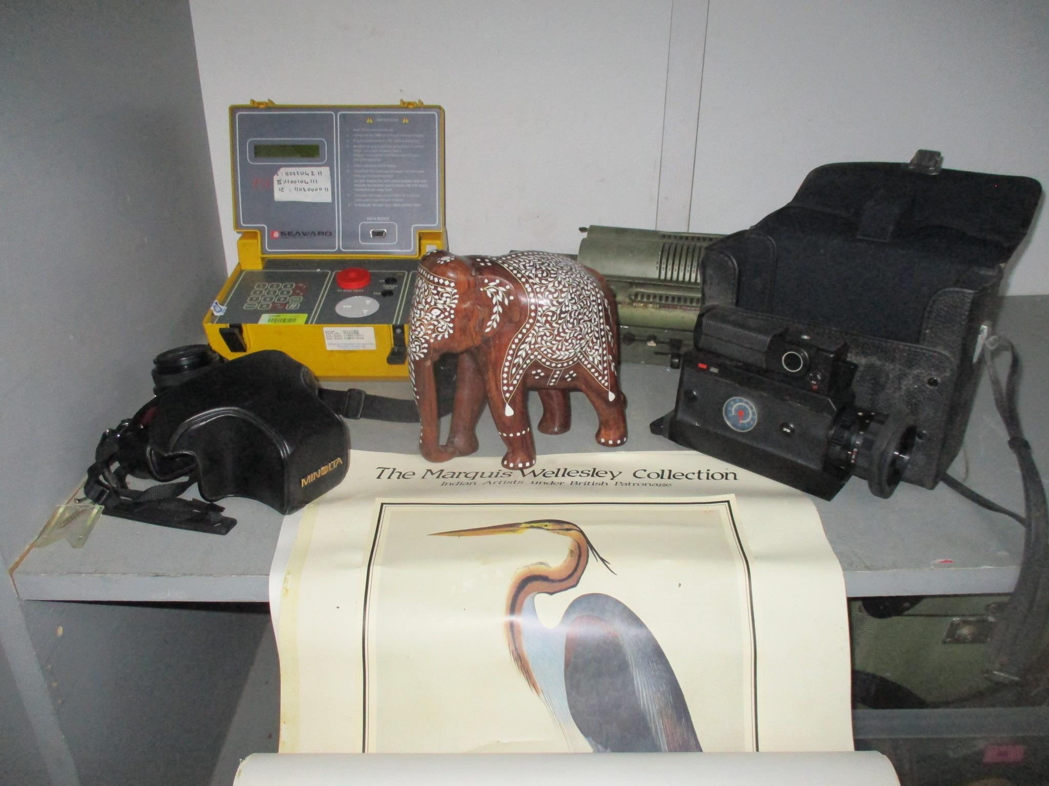 A mixed lot to include an Antares mechanical calculator, a Seaward electronic PAT tester, Minolta