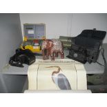 A mixed lot to include an Antares mechanical calculator, a Seaward electronic PAT tester, Minolta