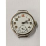 A WWI silver cased trench watch having a white enamel dial with Arabic numerals Location: