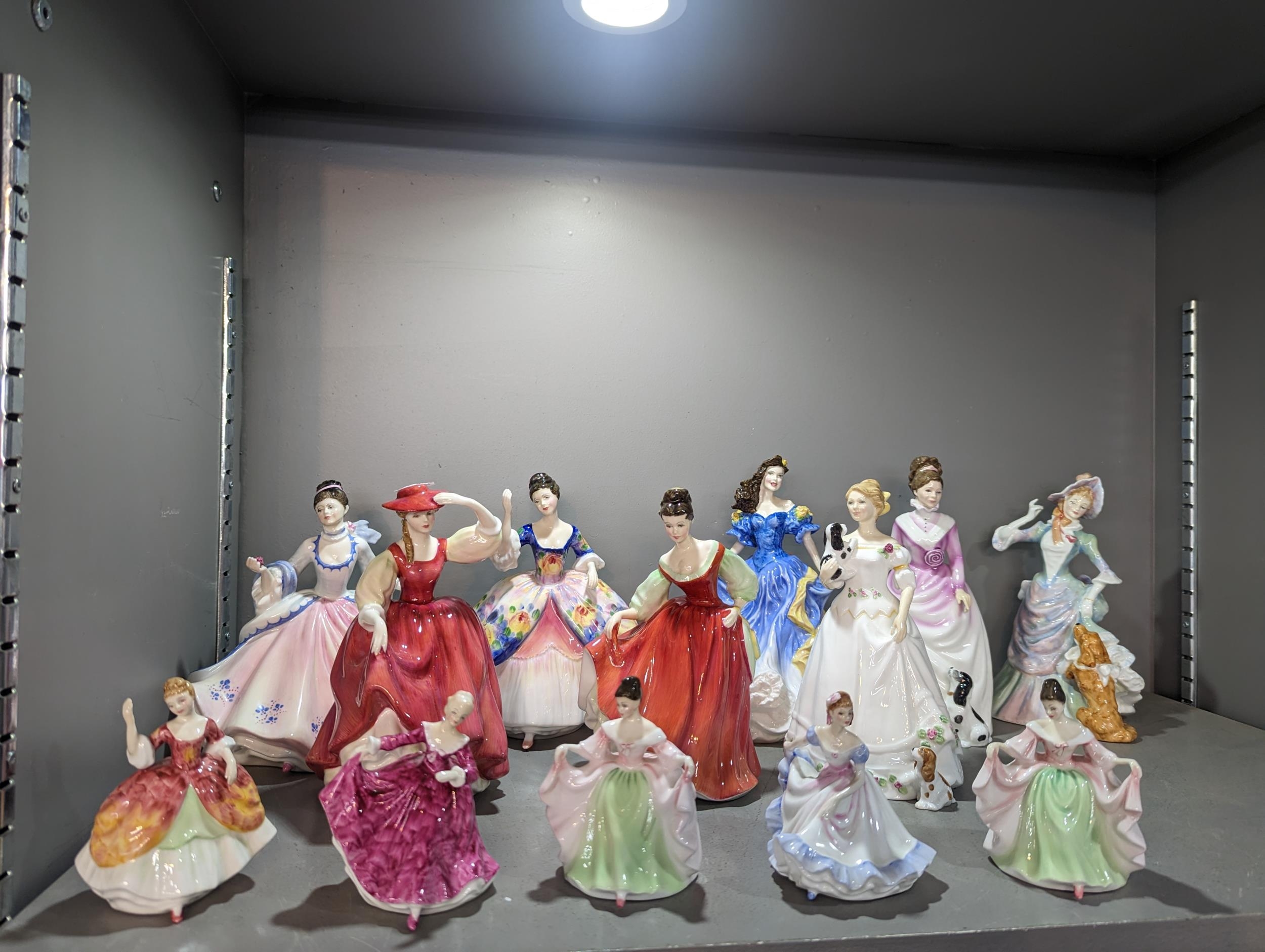 A collection of thirteen Royal Doulton figures of ladies to include 'Fair Lady', 'Take me Home'