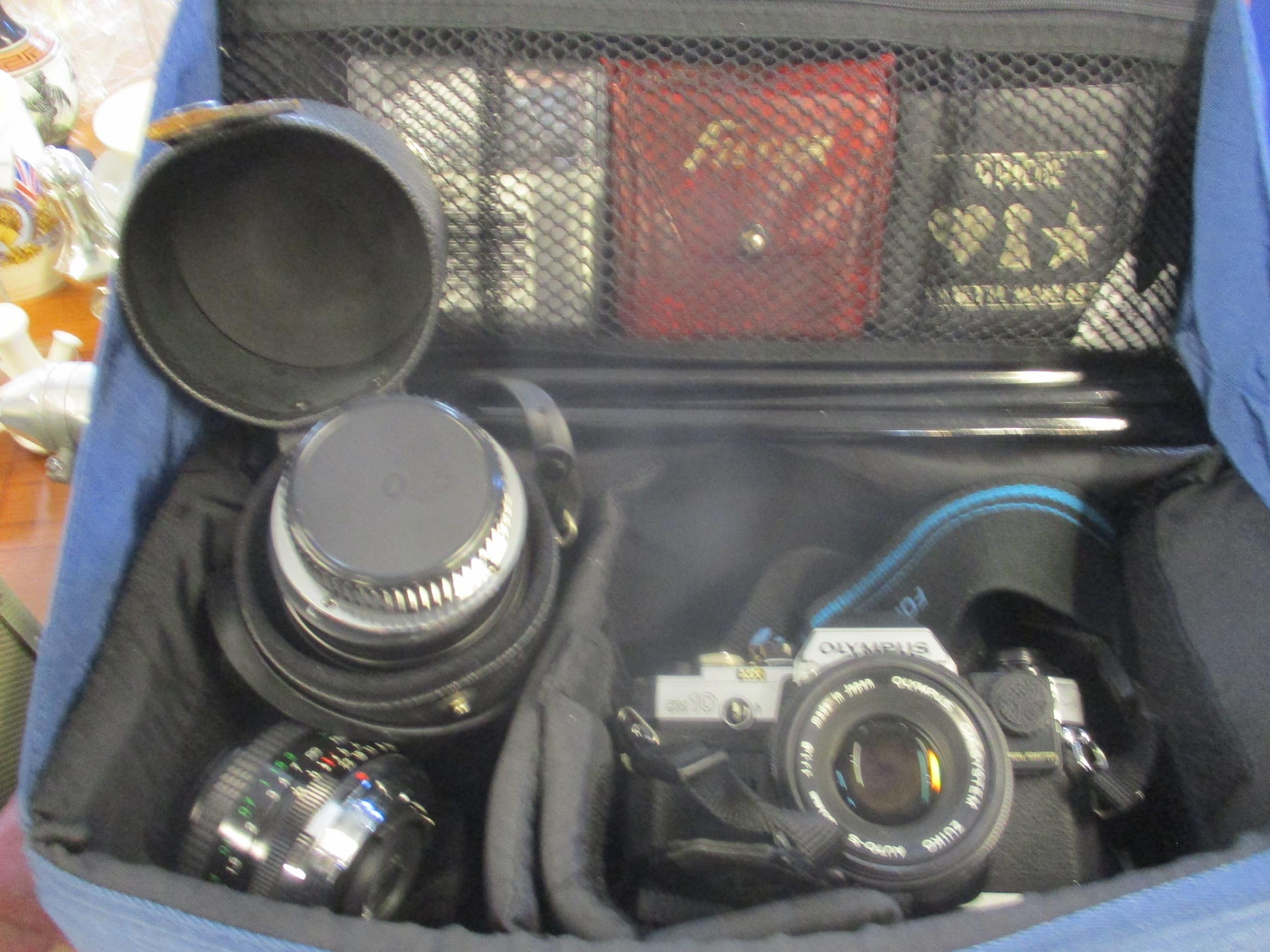 A mixed lot of film cameras and accessories, 3-D Viewmaster, projectors, and other items to