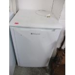 A Hotpoint fridge Location: