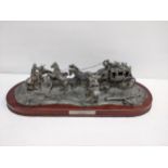 A Franklin Mint limited edition pewter model 'Hold up' on a wooden stand Location: