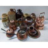 Copper to include pans and kettles along with a stoneware flagon Location: