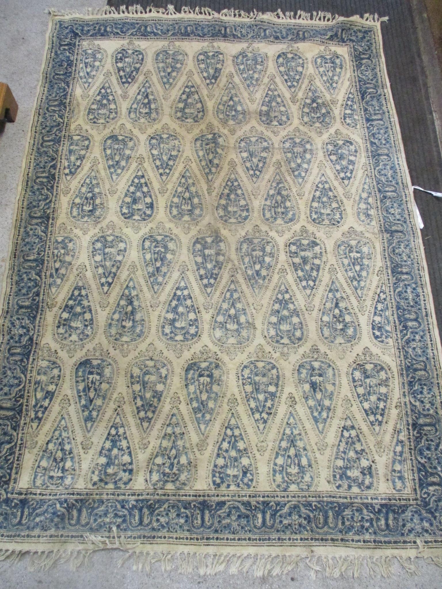 An Afghan handwoven rug, four central elephant gulls on a red ground, triple guard border 205cm x - Image 2 of 2